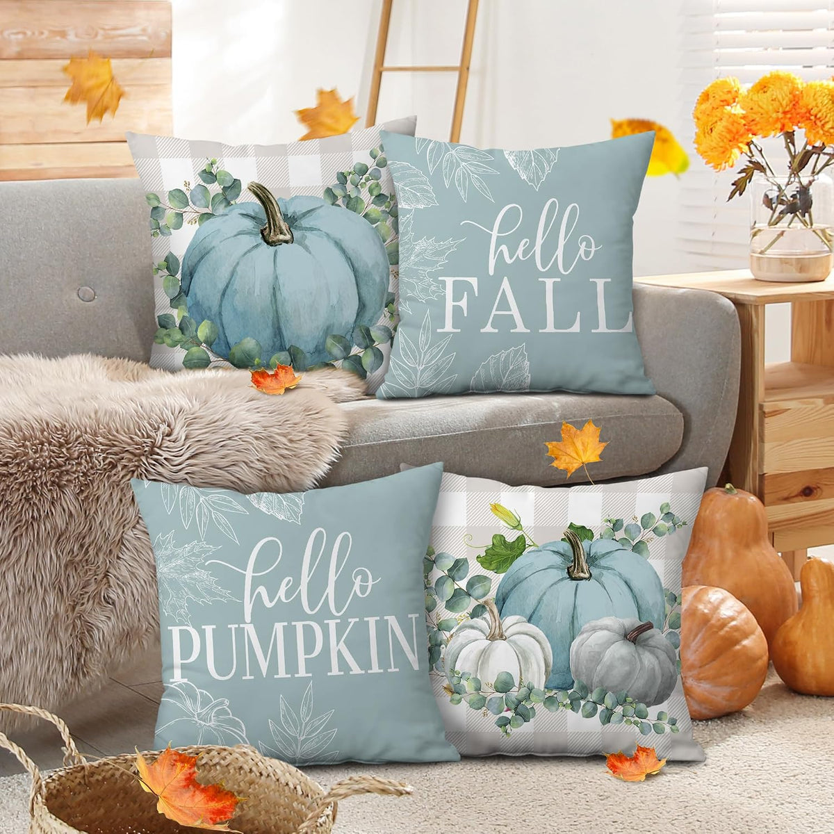 Teal pumpkin fall throw pillow cover on a sofa
