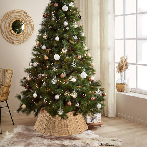 Woven tree collar around an artificial christmas tree